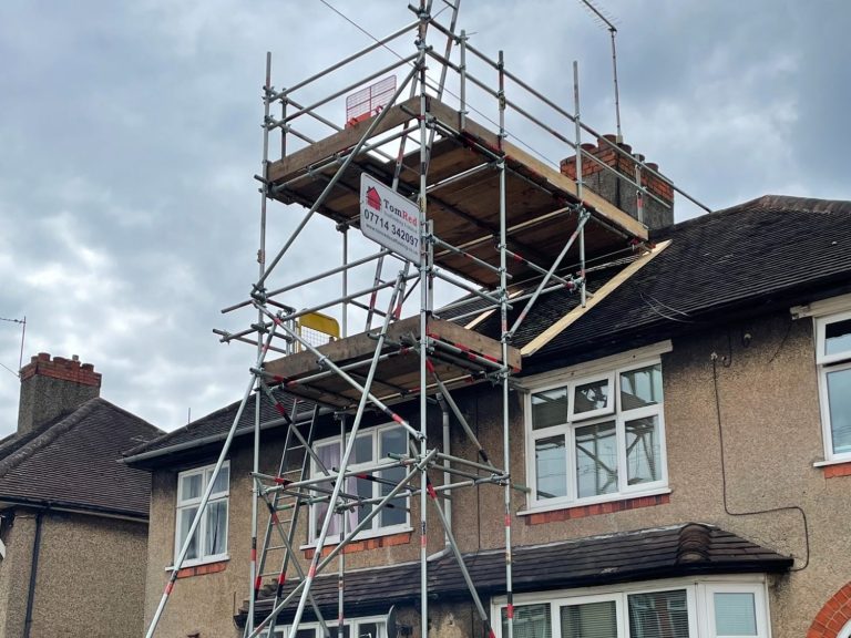 Scaffolding erected on a house for building maintenance or renovation.